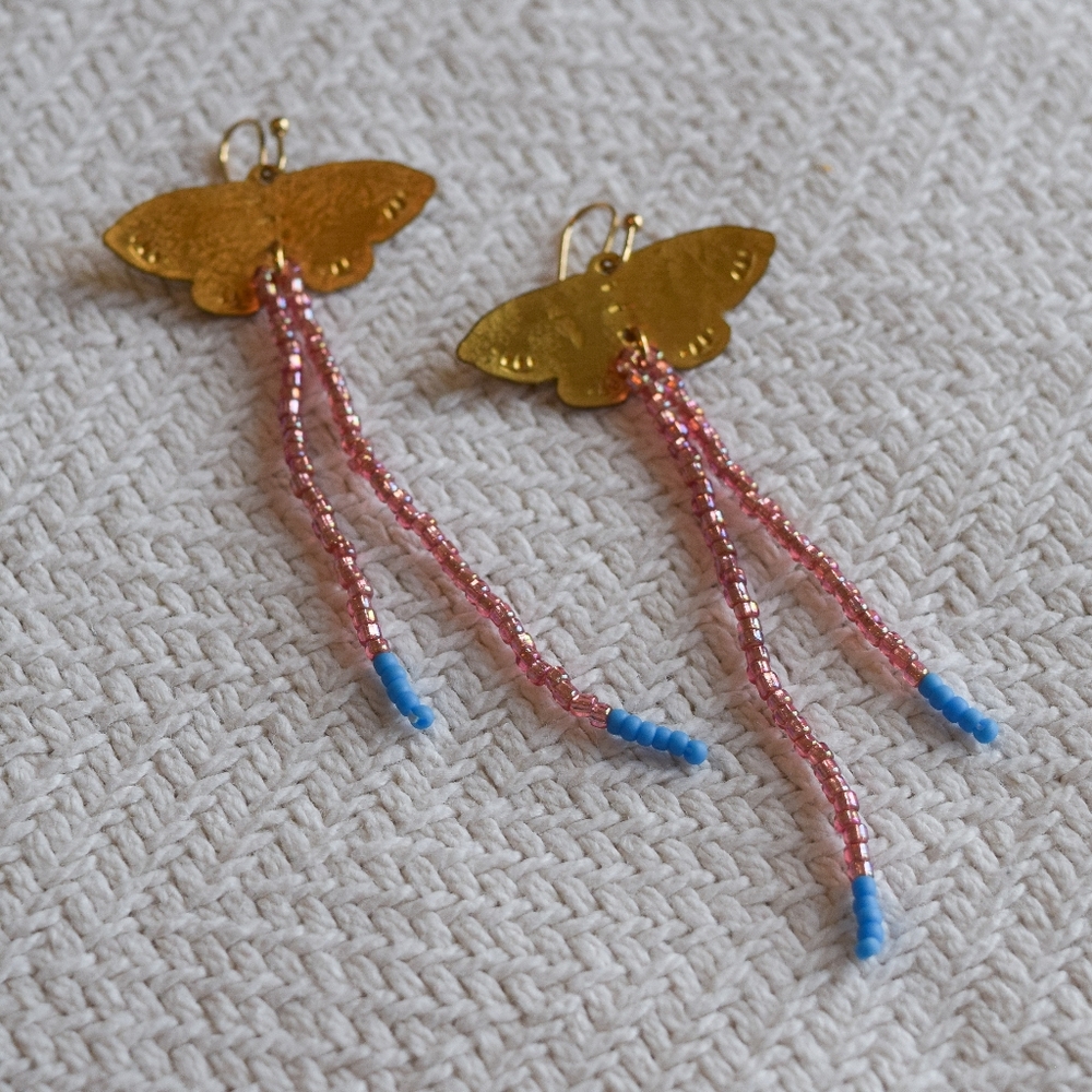 Handmade butterfly stamped metal dangly beaded pink and blue earrings